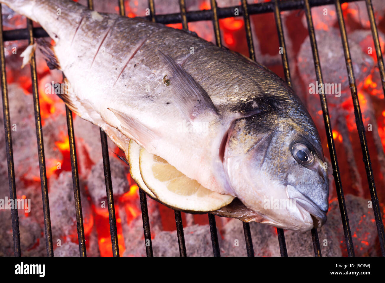 bream on a charcoal grill Stock Photo