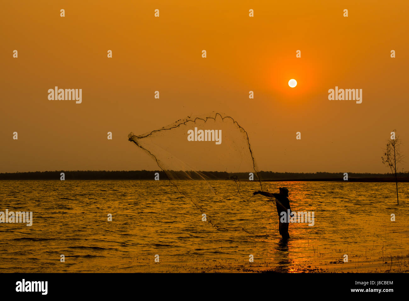 Boy fishing sunset hi-res stock photography and images - Alamy