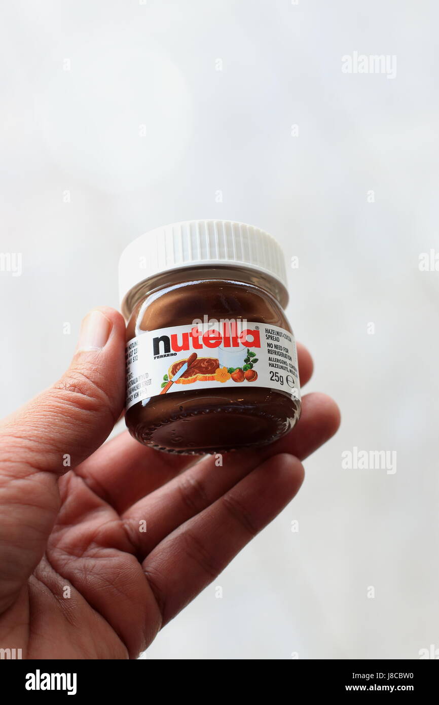 Mini Nutella Container on Pink Background Editorial Stock Image