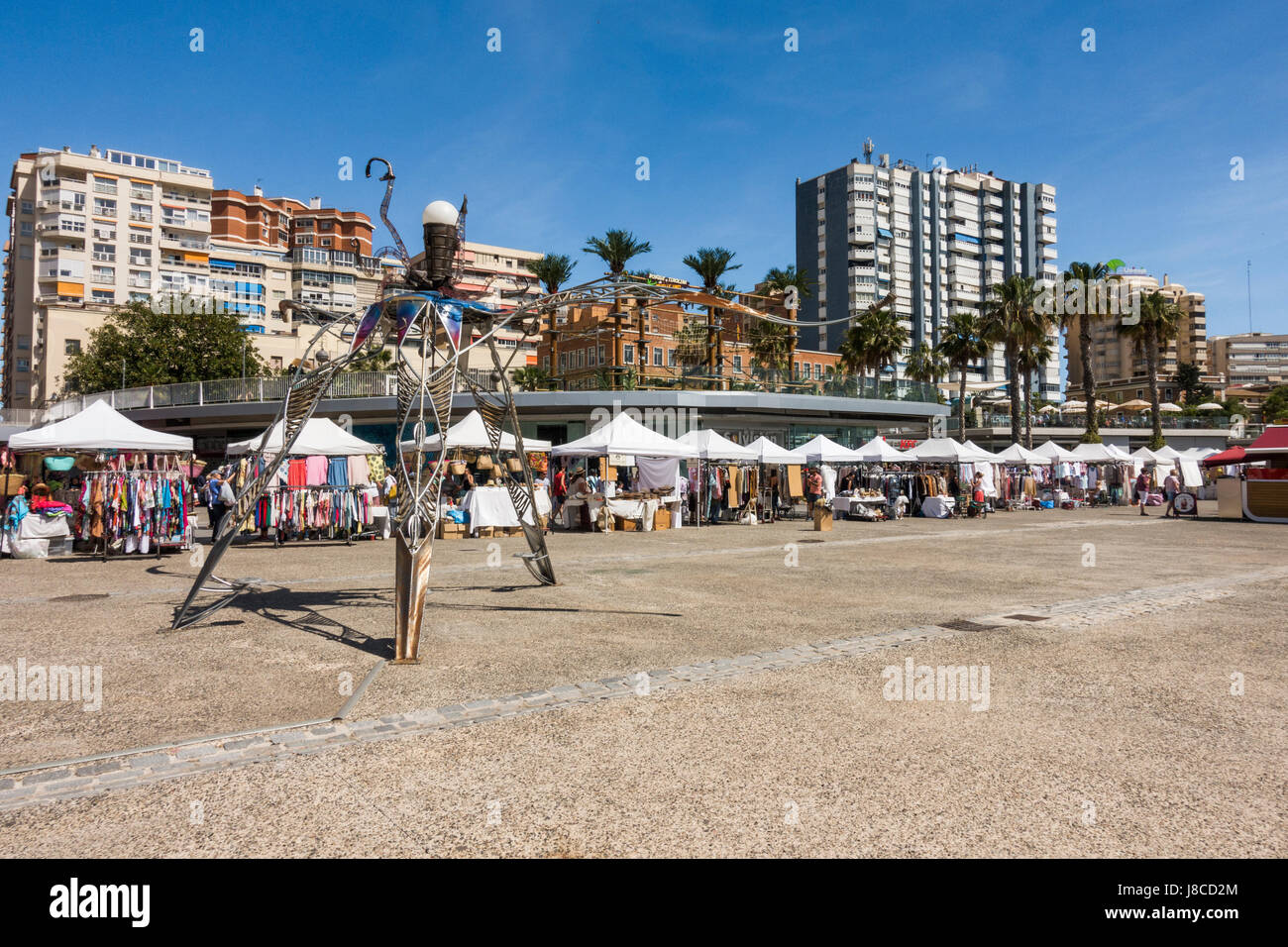 Modern Marina and waterfront promenade in Malaga, with kiosks and sale
