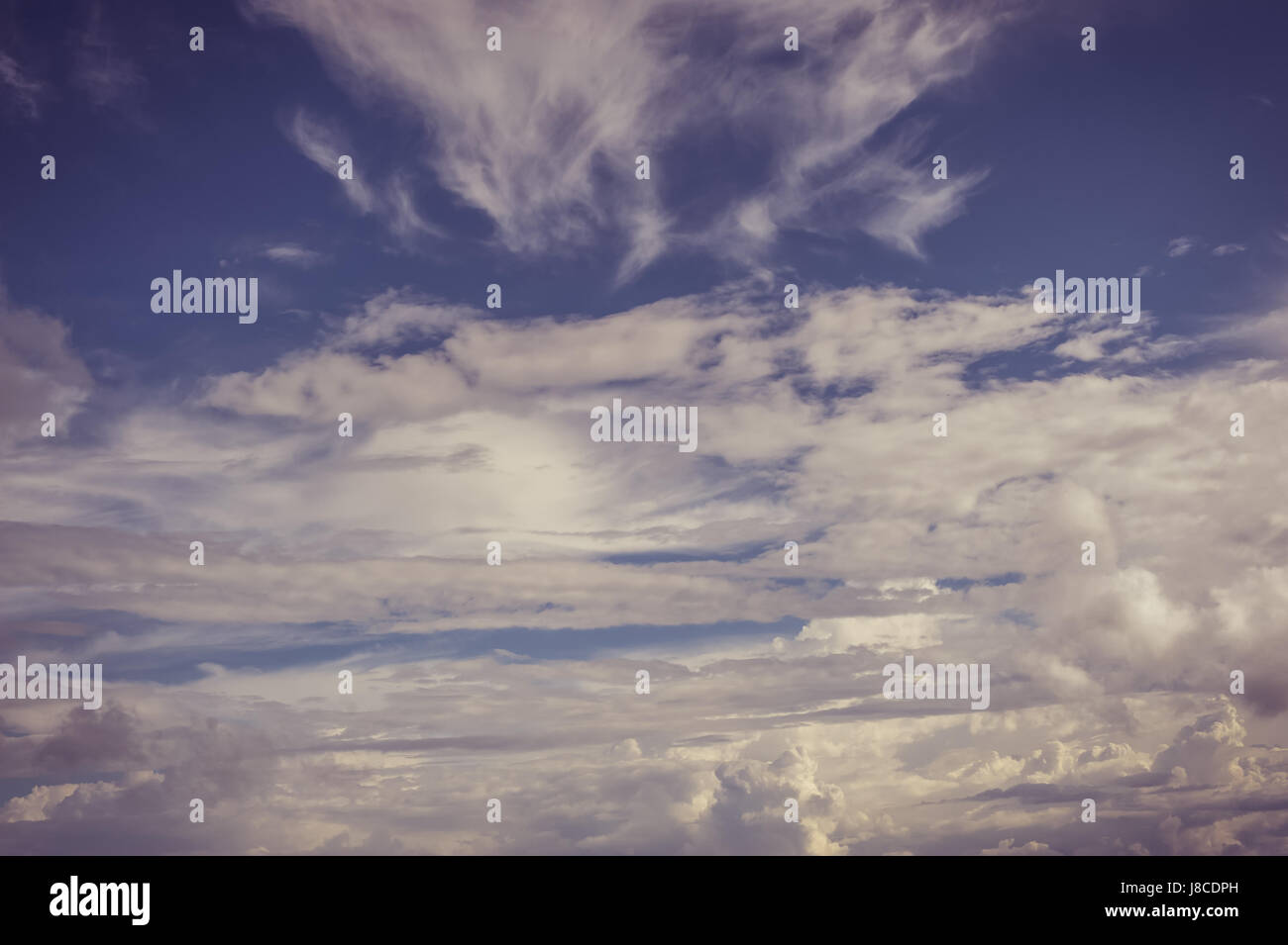 white fluffy clouds with background blue sky Stock Photo - Alamy