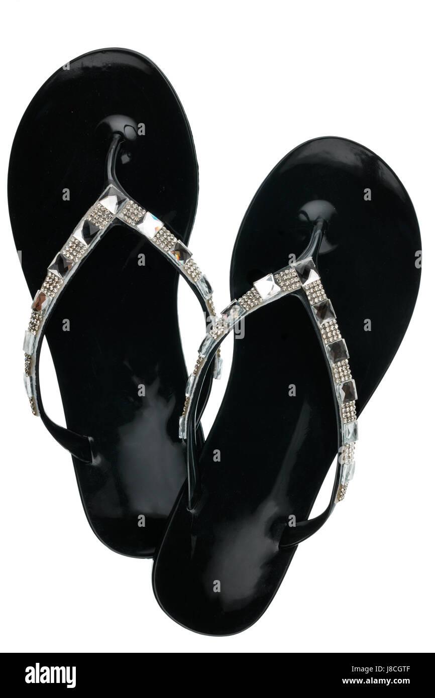Pair of black beach sandals encrusted rhinestones, isolated on white background. View from above Stock Photo