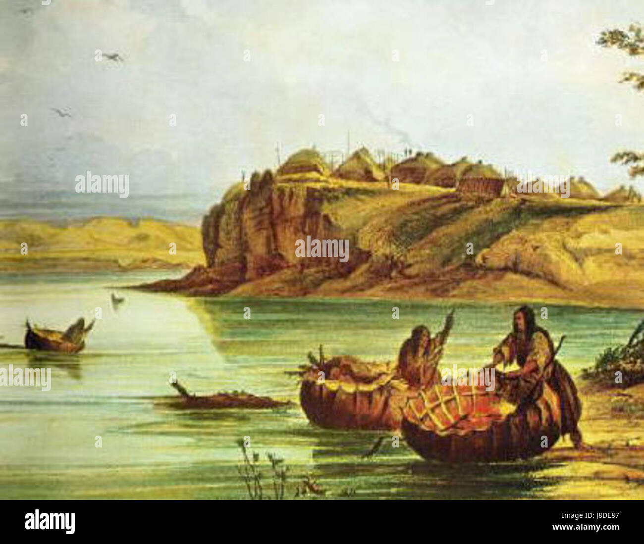 George Catlinâ€™s artwork captures the Mandan Native American tribe, specifically their bull boats and lodges, emphasizing their culture and way of life in the 19th century. Stock Photo