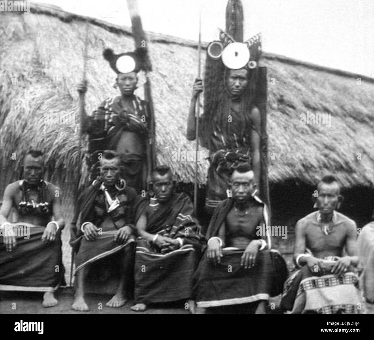 The term 'early nagas' refers to the early inhabitants of the Naga Hills, an ethnic group in the northeastern region of India. The Nagas are known for their distinct cultural practices, including their traditional dress and social structure, which have evolved over time. Stock Photo