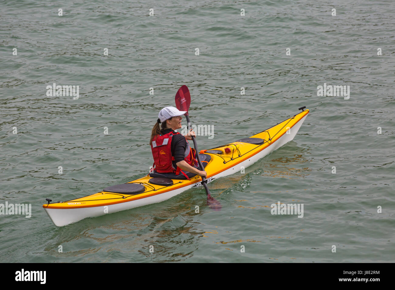 Woman wearing lifejacket hi-res stock photography and images - Alamy