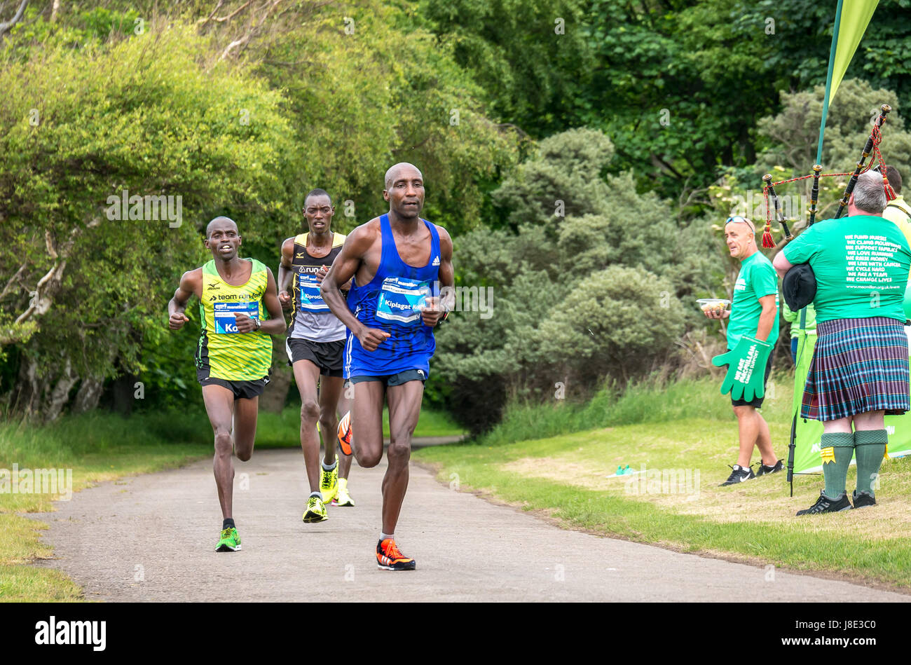 Gosford Estate, East Lothian, Scotland, UK. 28th May, 2017 Top Kenyan male runners Stanley Kiprotich Bett, Julius Kiplagat Korir and Japhet Koech in the Edinburgh Marathon Festival 2017 at Mile 18 Stock Photo