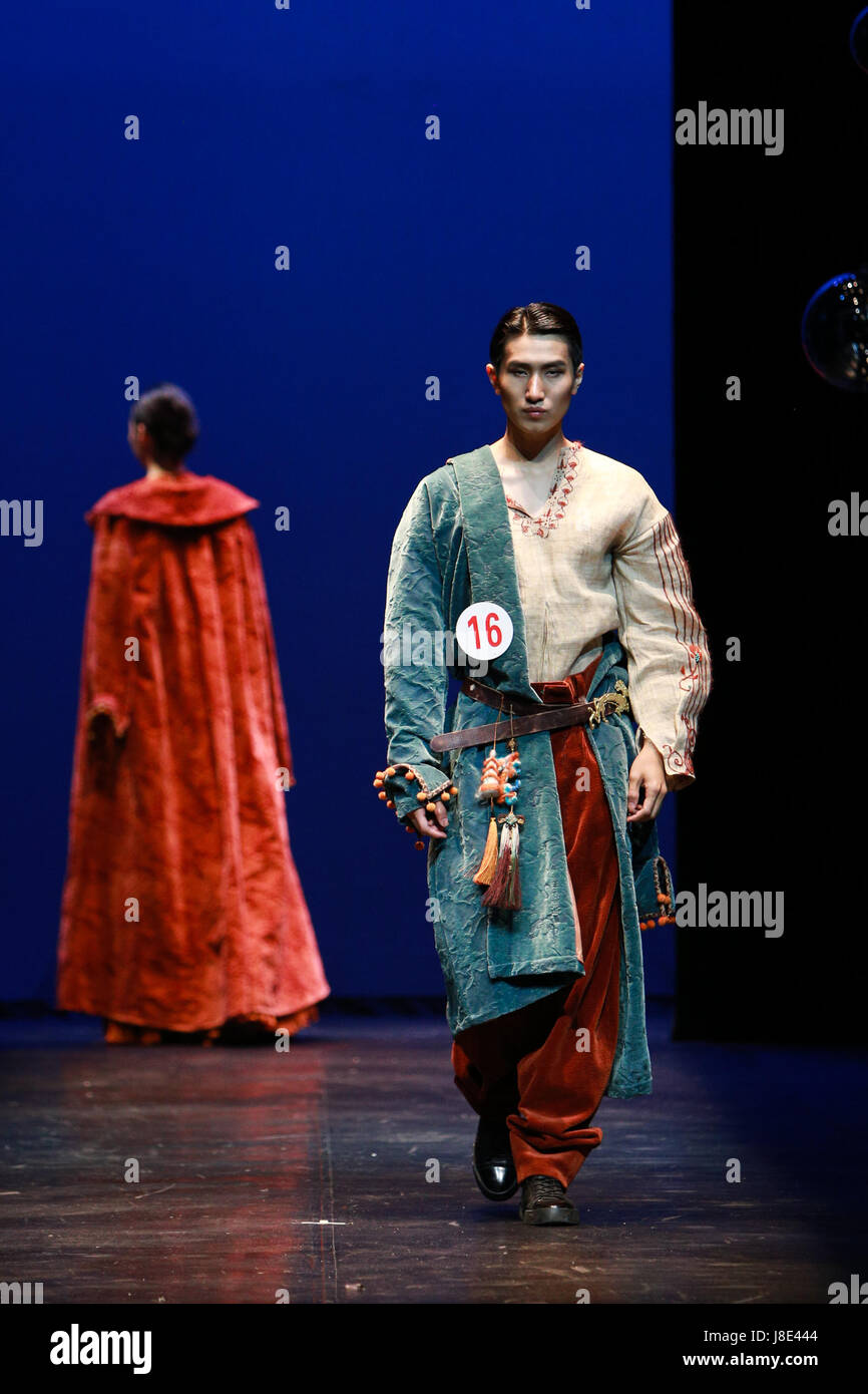 Beijing, China. 28th May, 2017. Models display creations during the final performance of the 4th Beijing figurative design competition of college students at the Central Academy of Drama in Beijing, capital of China, May 28, 2017. The competition was held every two years since 2011 and it has become an important competition for university students of art design. Credit: Xin Yuewei/Xinhua/Alamy Live News Stock Photo