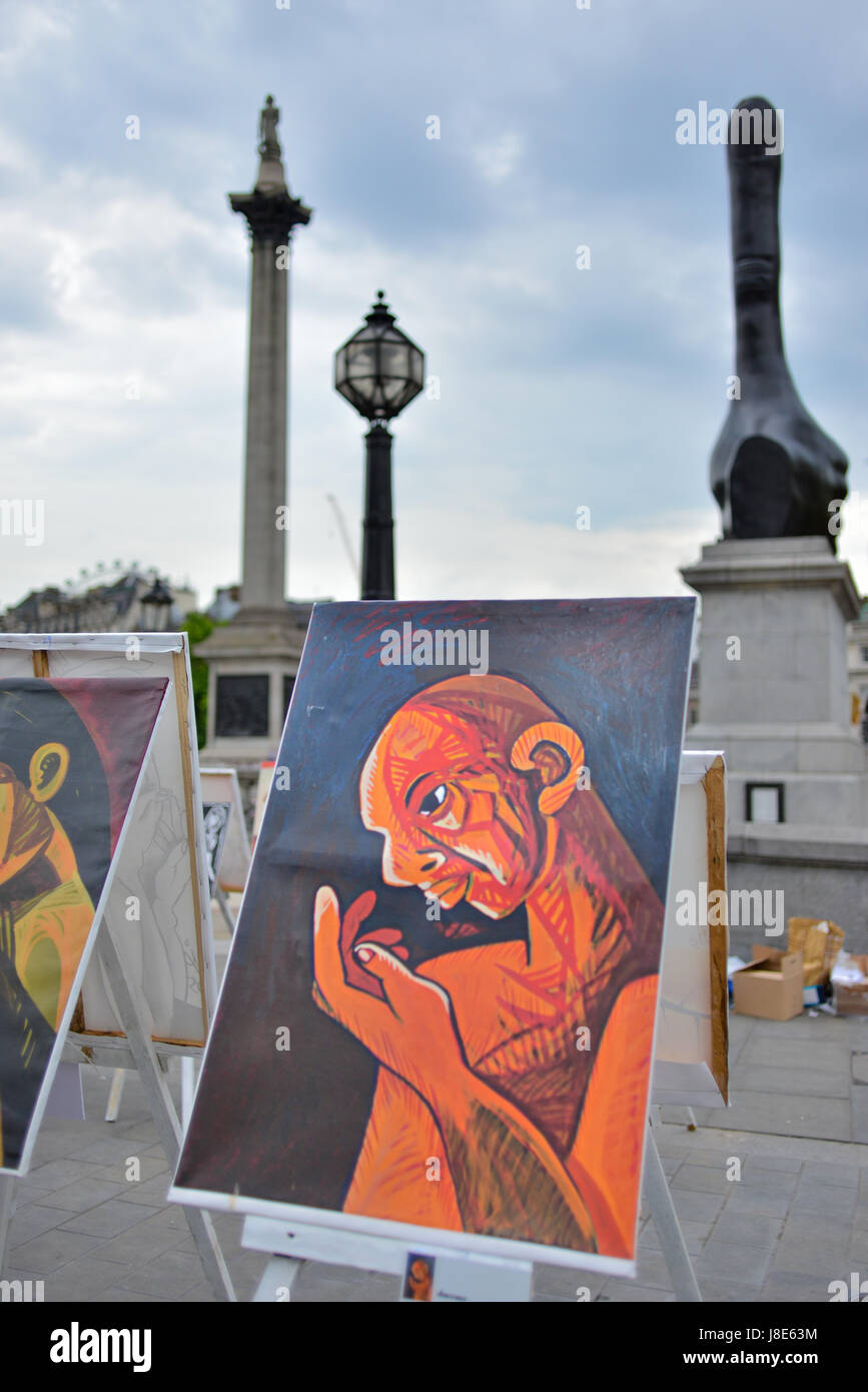 Trafalgar Square, London, UK. 28th May 2017. Tamil genocide remembrance paintings by artist Pugazhenthi on display in Trafalgar Square Credit: Matthew Chattle/Alamy Live News Stock Photo