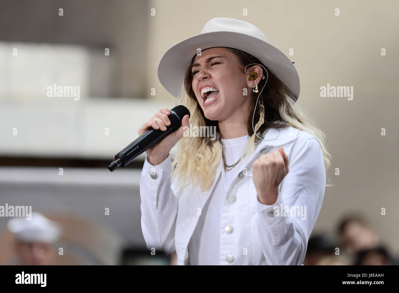 US singer Miley Cyrus performs on stage during NBC's Today show at the Rockefeller Plaza in New York on May 26, 2017. credit: Erik Pendzich Stock Photo