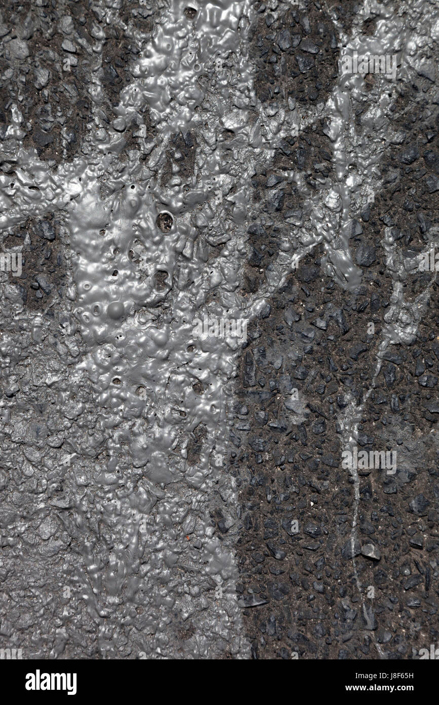 Old black paint bubbling paint texture melting in sunlight Stock Photo