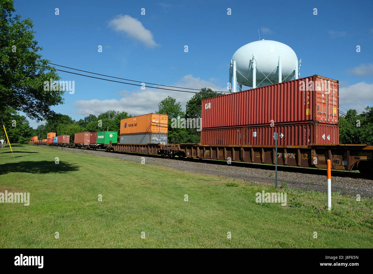 Double stack containers on a freight train. Stock Photo