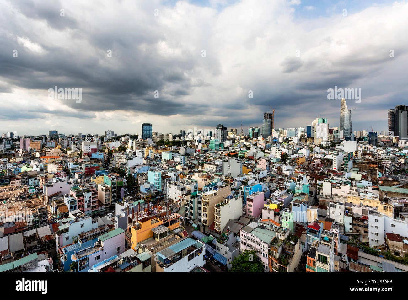 February 2017 - Ho Chi Minh City, Vietnam. Aerial view of the colorful rooftops of Saigon. Stock Photo
