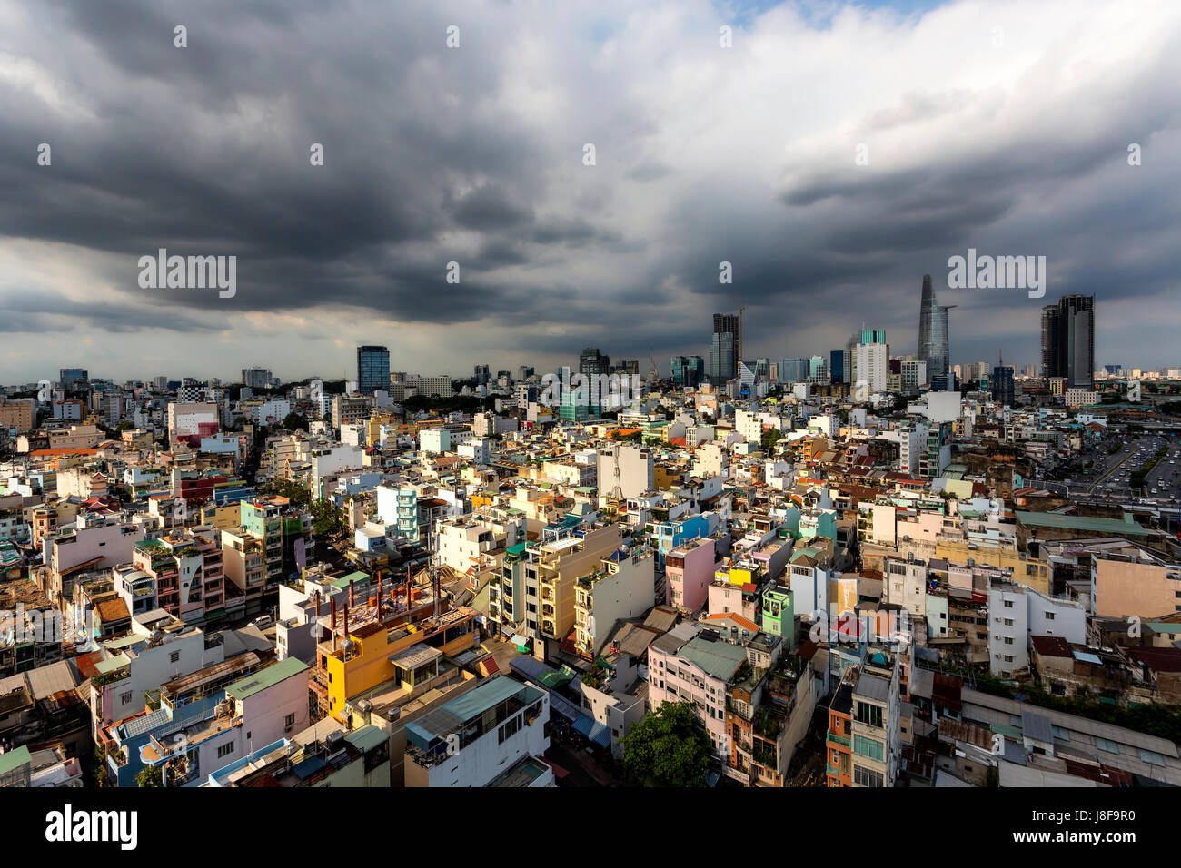 February 2017 - Ho Chi Minh City, Vietnam. View of the colorful rooftops of Saigon on a stormy day. Stock Photo