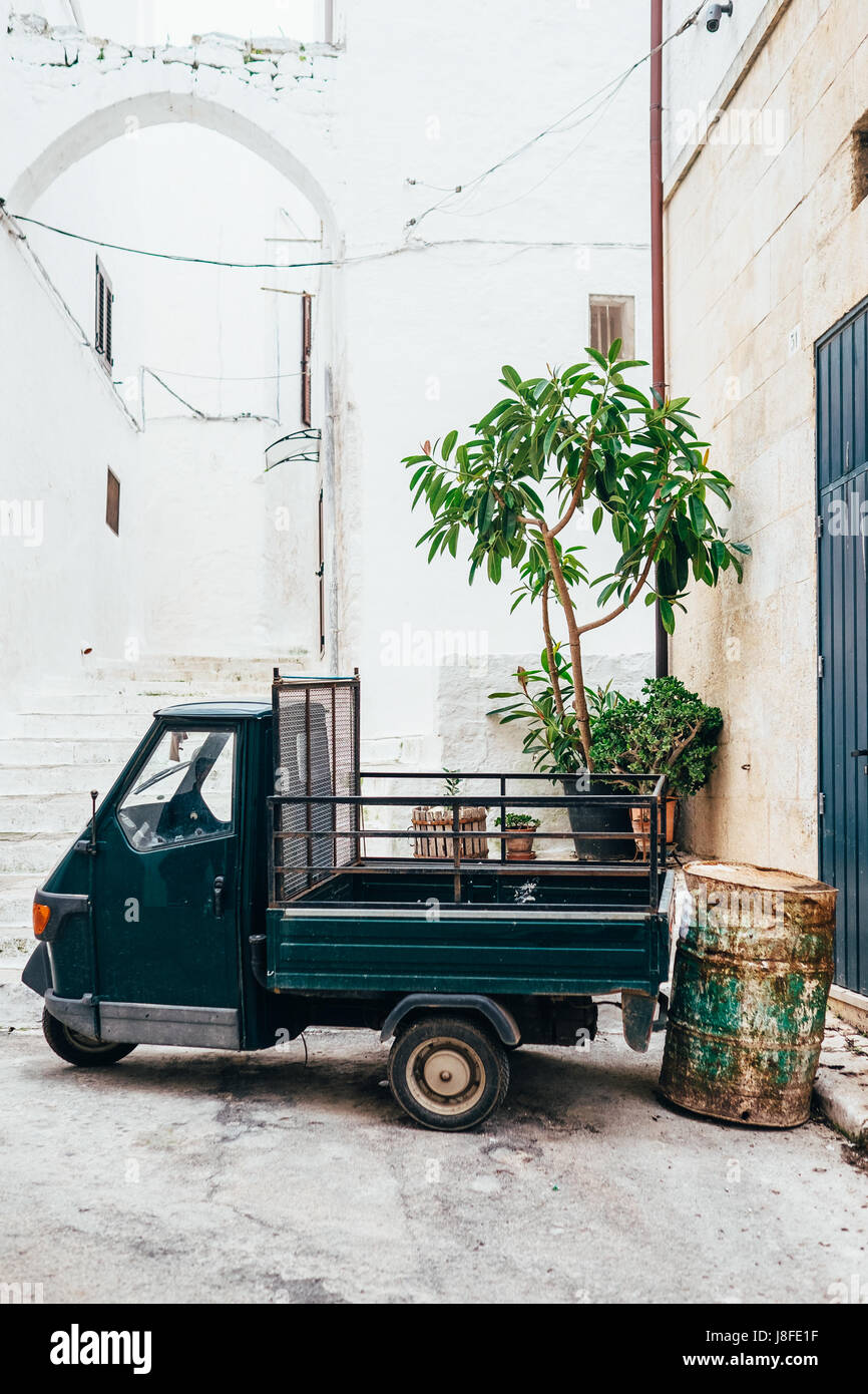 A vintage "ape" car parked in Ostuni, Puglia, Italy Stock Photo Alamy