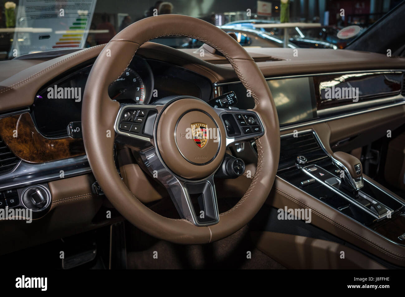 Interior of the full-size luxury car Porsche Panamera Turbo, 2016. Europe's  greatest classic car exhibition "RETRO CLASSICS Stock Photo - Alamy