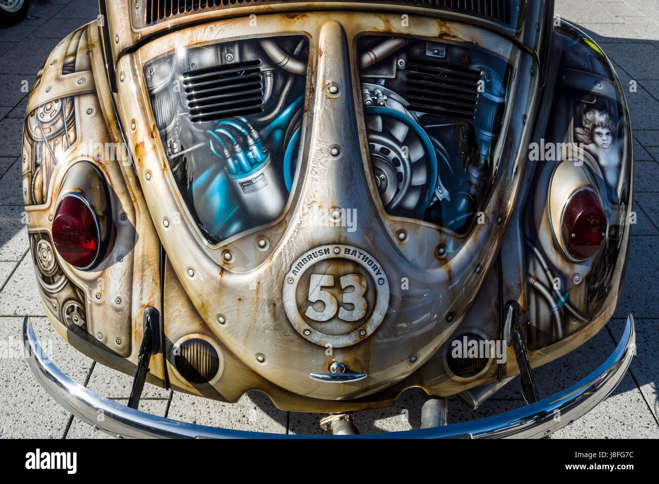 Fragment of compact car Volkswagen Beetle in unusual body painting (aerography). Europe's greatest classic car exhibition 'RETRO CLASSICS' Stock Photo