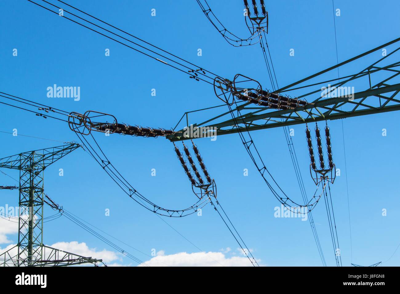 Detail of high-voltage ceramic insulator. High Voltage Lead. Electricity  distribution Stock Photo - Alamy