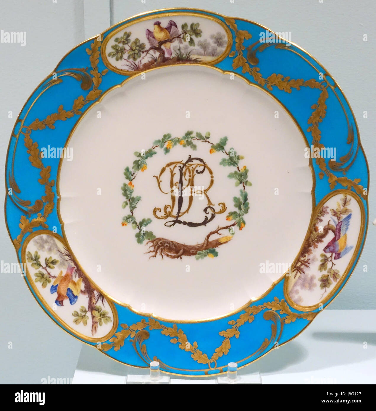Dessert plate, Prince de Rohan Service, Sevres Porcelain Manufactory,  France, 1771, soft paste porcelain, turquoise ground, polychrome enamel,  gilding Krannert Art Museum, UIUC DSC06615 Stock Photo - Alamy
