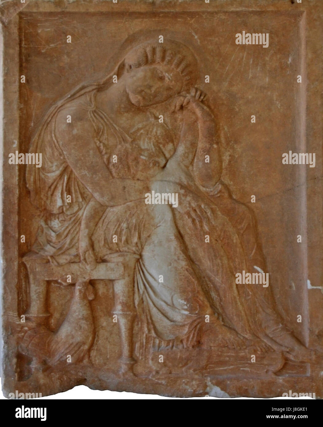 Funeral Stele Depicting a Mother, Child and Cockerel Stock Photo