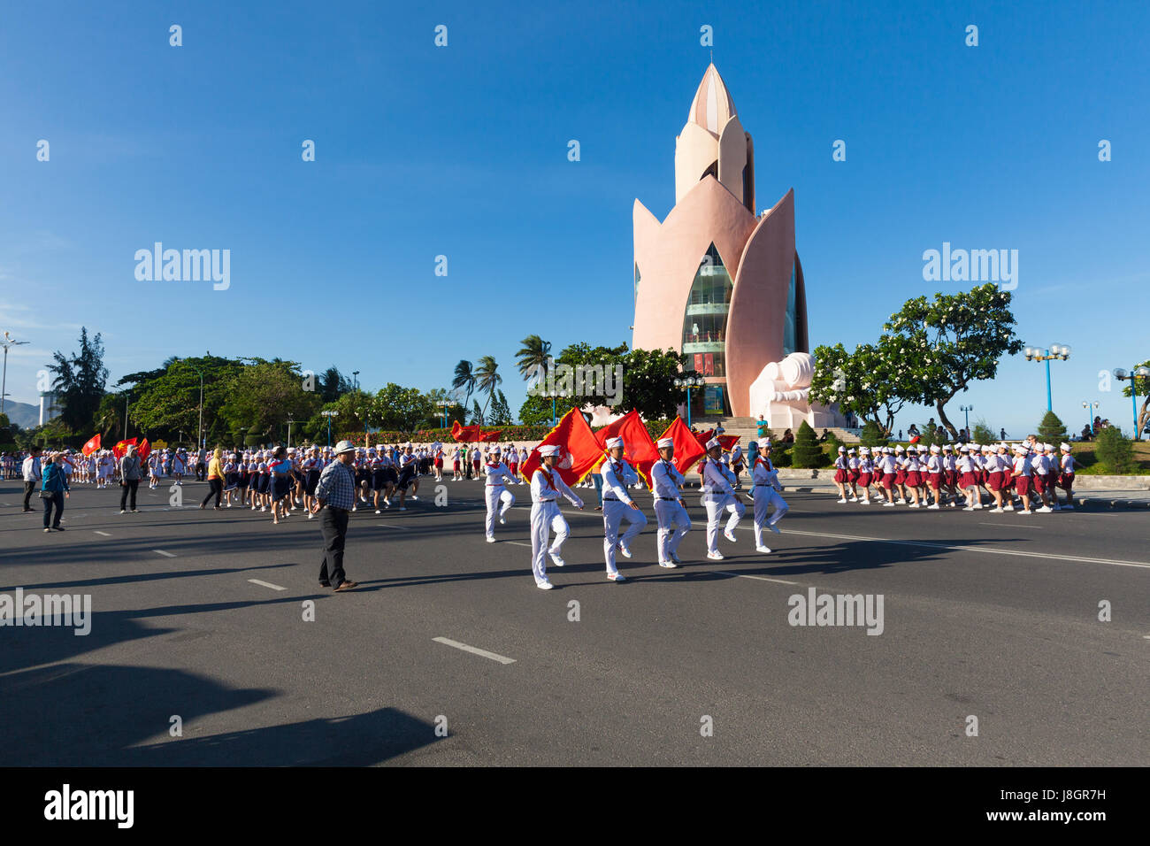 Nha Trang, Vietnam - May 31, 2016: Pioneer children march on the parade at the end of the school year in Nha Trang, Vietnam on May 31, 2016. Stock Photo