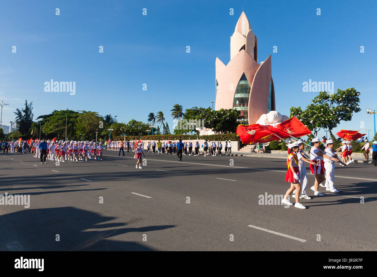 Nha Trang, Vietnam - May 31, 2016: Pioneer children march on the parade at the end of the school year in Nha Trang, Vietnam on May 31, 2016. Stock Photo