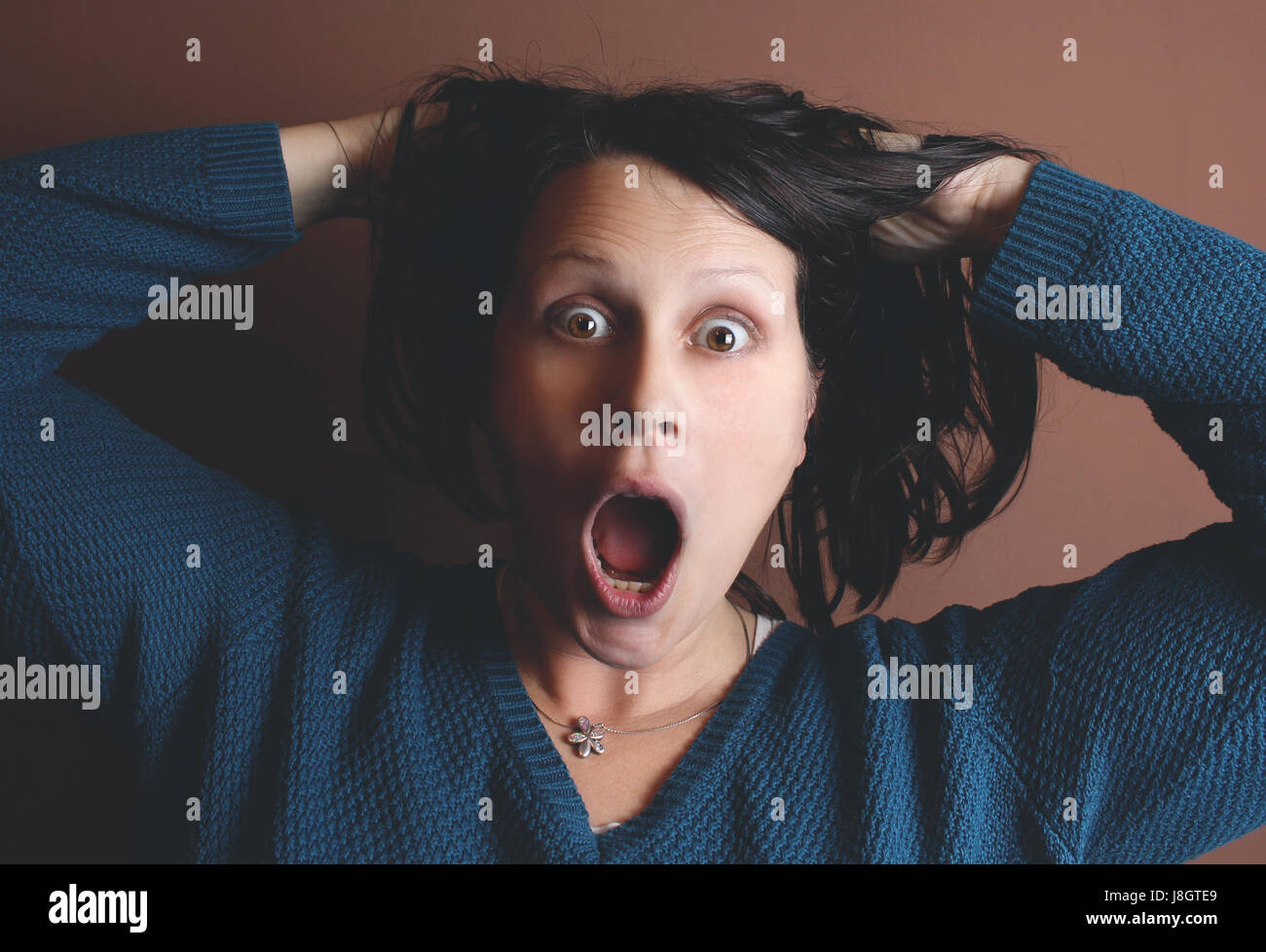 Stunned facial expression Stock Photo