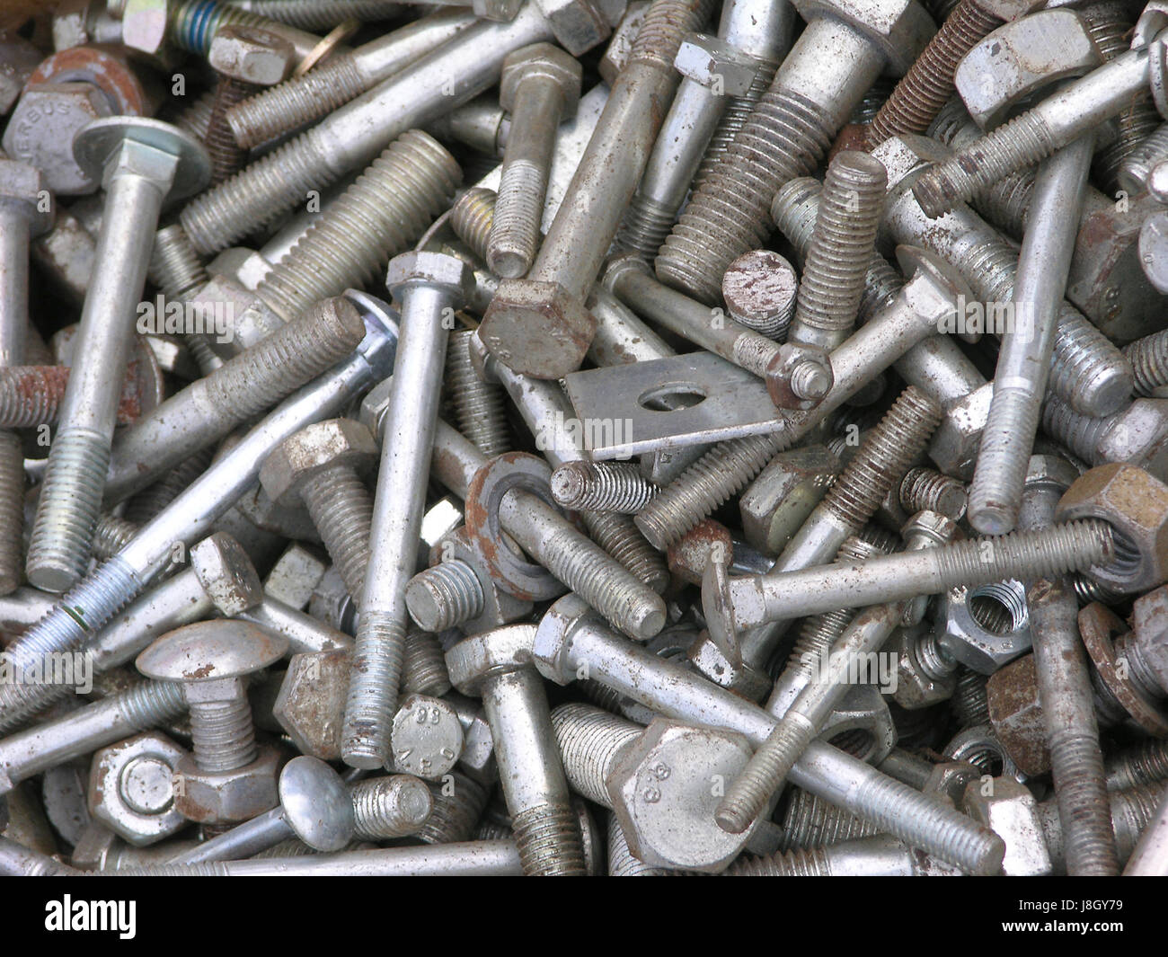 A bucnh of bolts and nuts in different sizes Stock Photo Alamy
