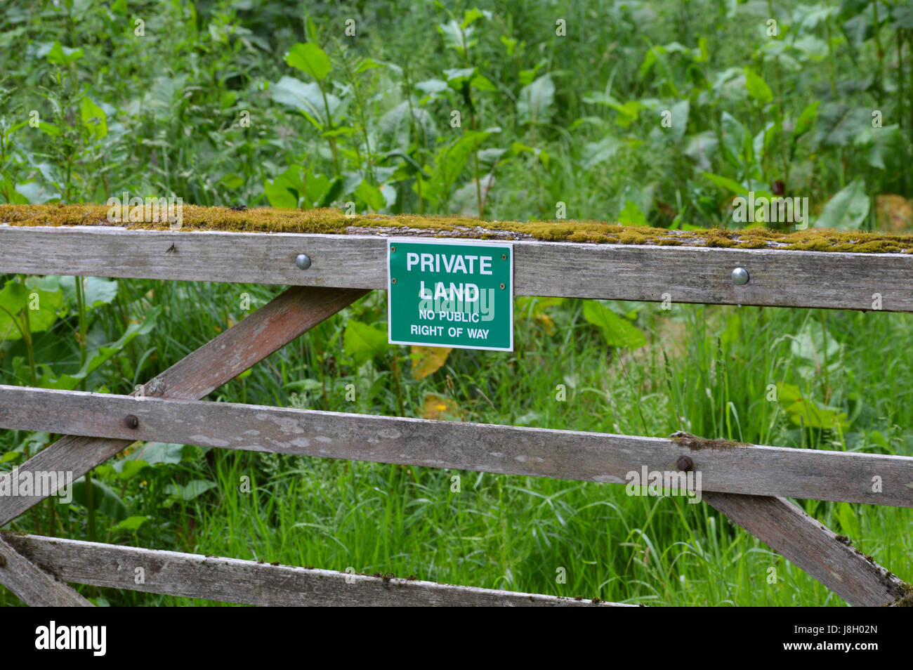 Private land sign attached to gate in the Sussex countryside. Stock Photo