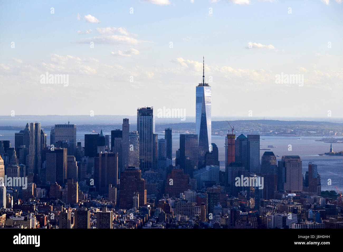 view of lower manhattan with one world trade center tower and financial district skyline New York City USA Stock Photo