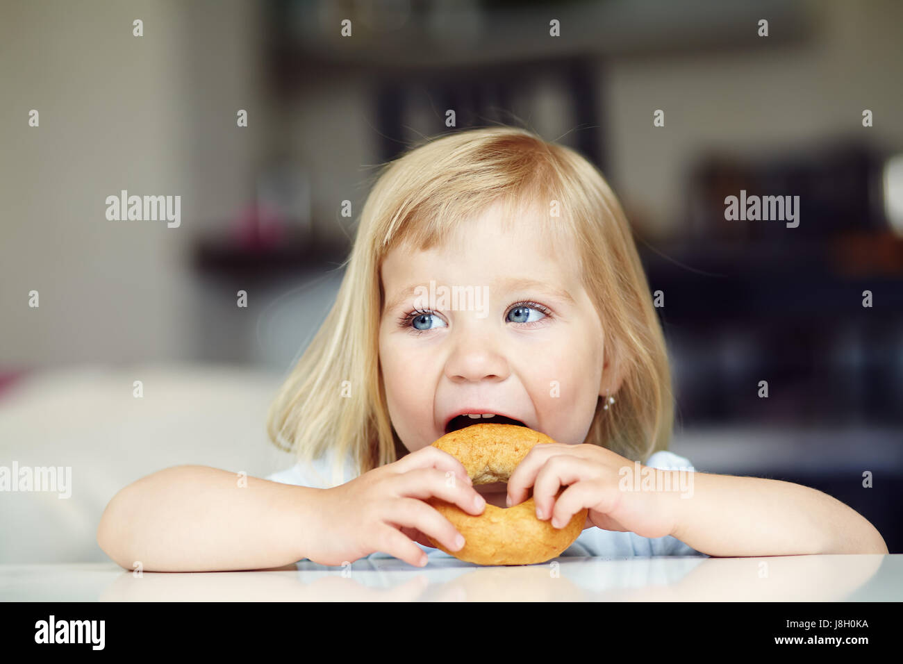 Funny little girl eating hi-res stock photography and images - Alamy