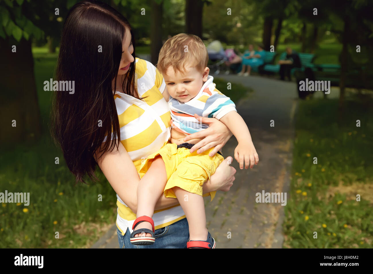 mother and son walking  Stock Photo