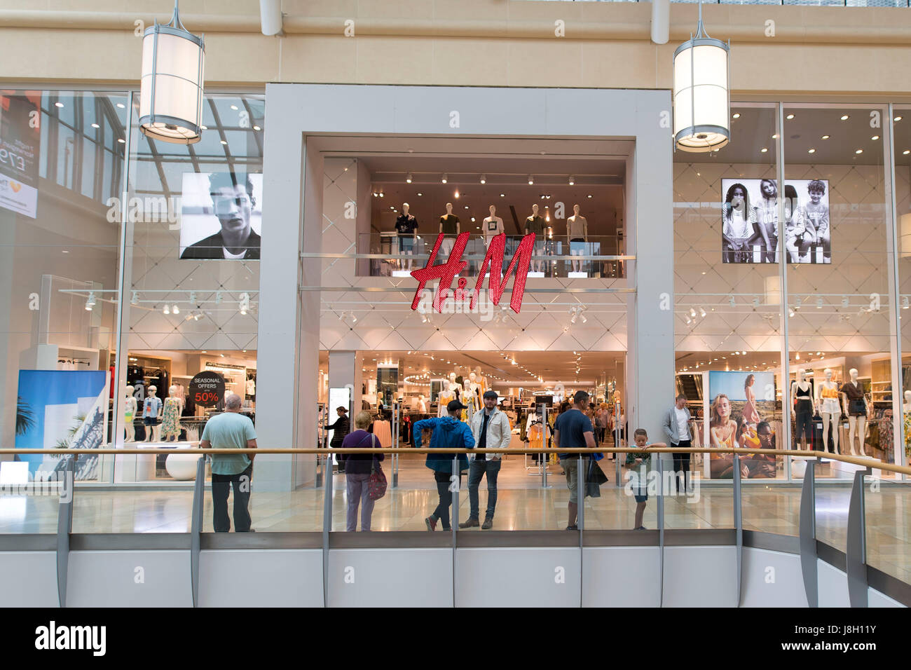 General view of the H&M clothing store sign logo in Cardiff, Wales, UK ...