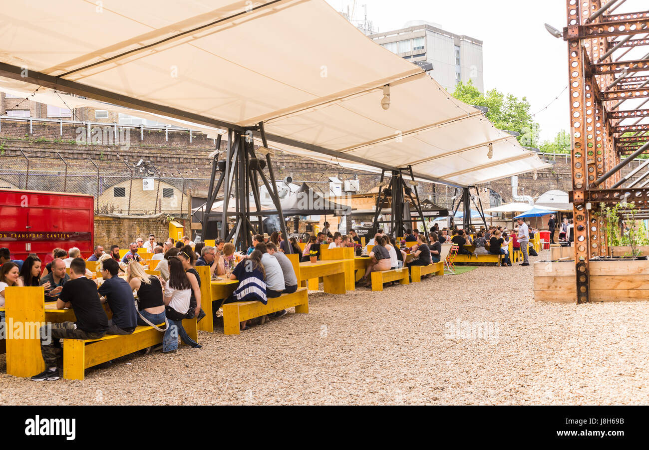 Mercato Metropolitano, a disused paper factory, in Elephant and Castle, is now a market space and lifestyle hub home to food stalls, shops and bars Stock Photo