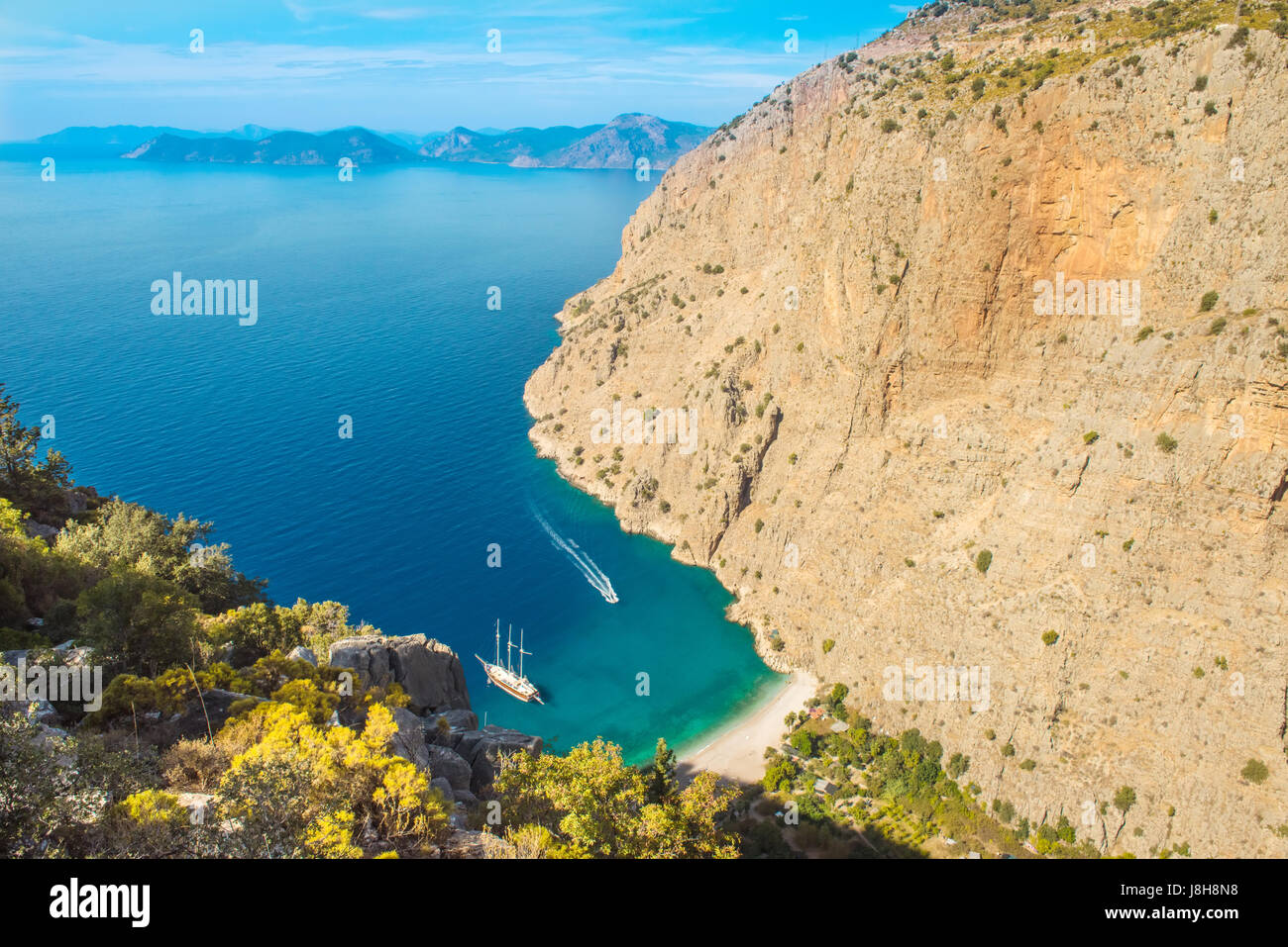 Butterfly valley sea view and boat Oludeniz,Turkey Stock Photo