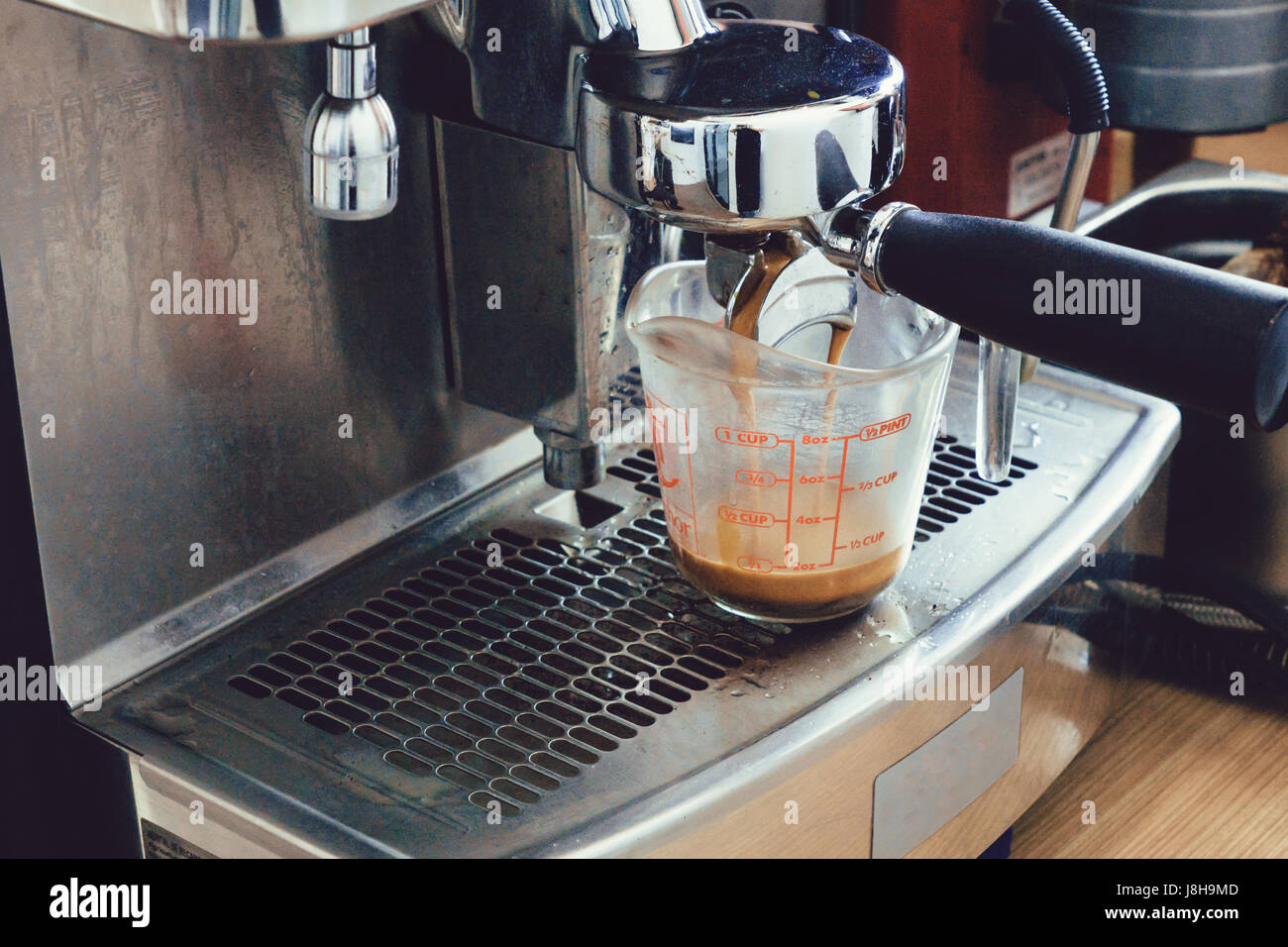 Coffee with standard glass measuring cup Stock Photo Alamy