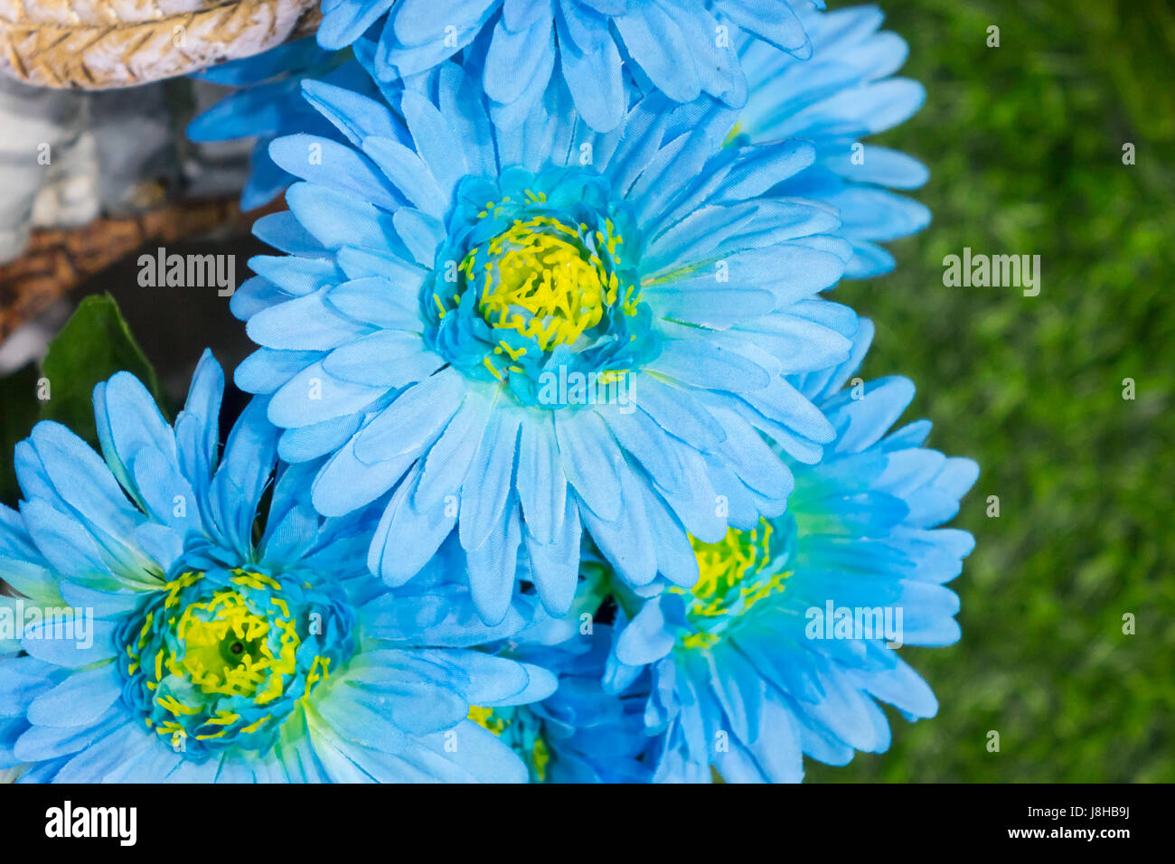 Gerbera fake flower and floral background. The fabric flowers bouquet. Colorful of decoration artificial flower Stock Photo
