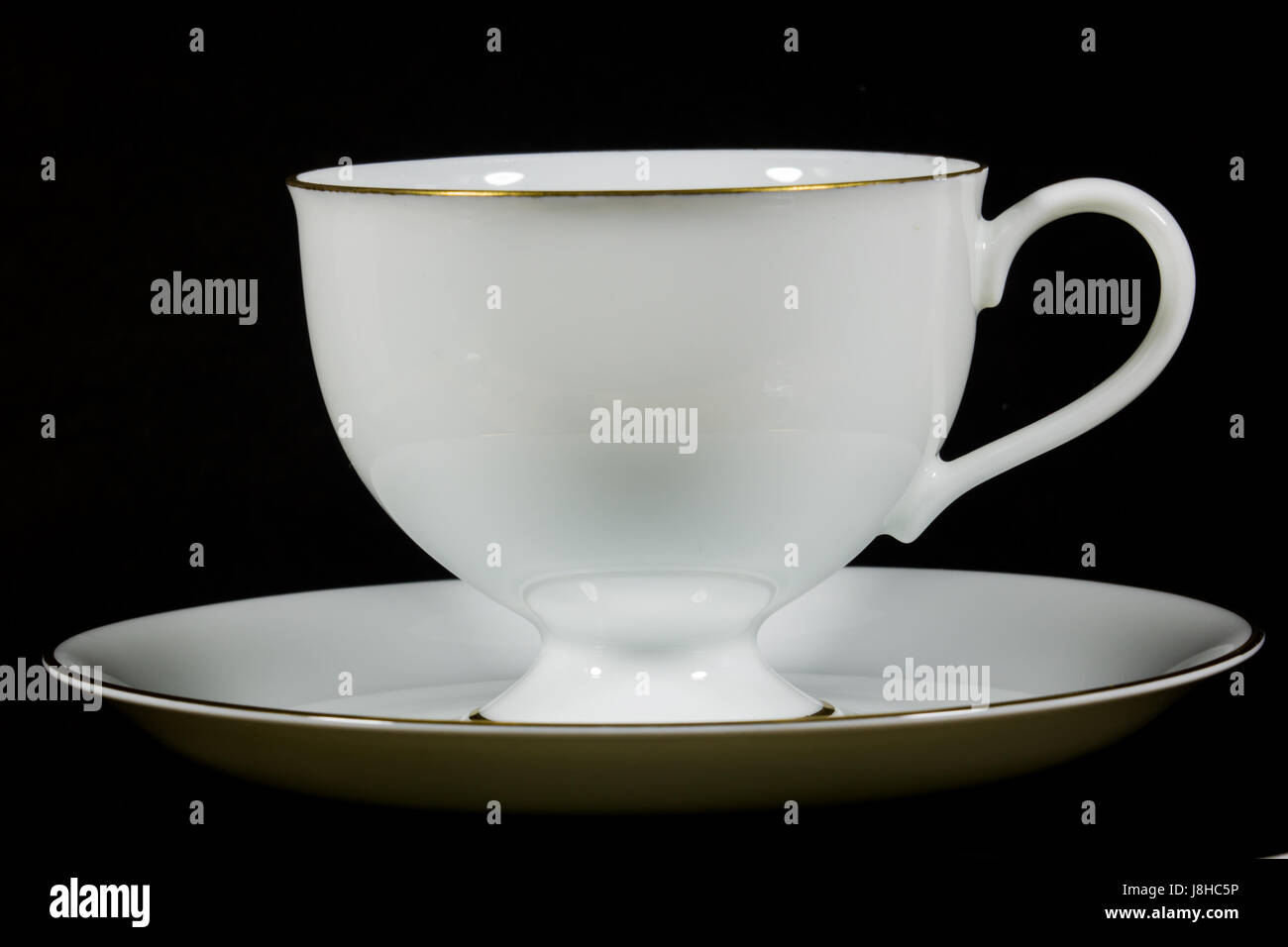 White Tea Cup on a black background Stock Photo Alamy