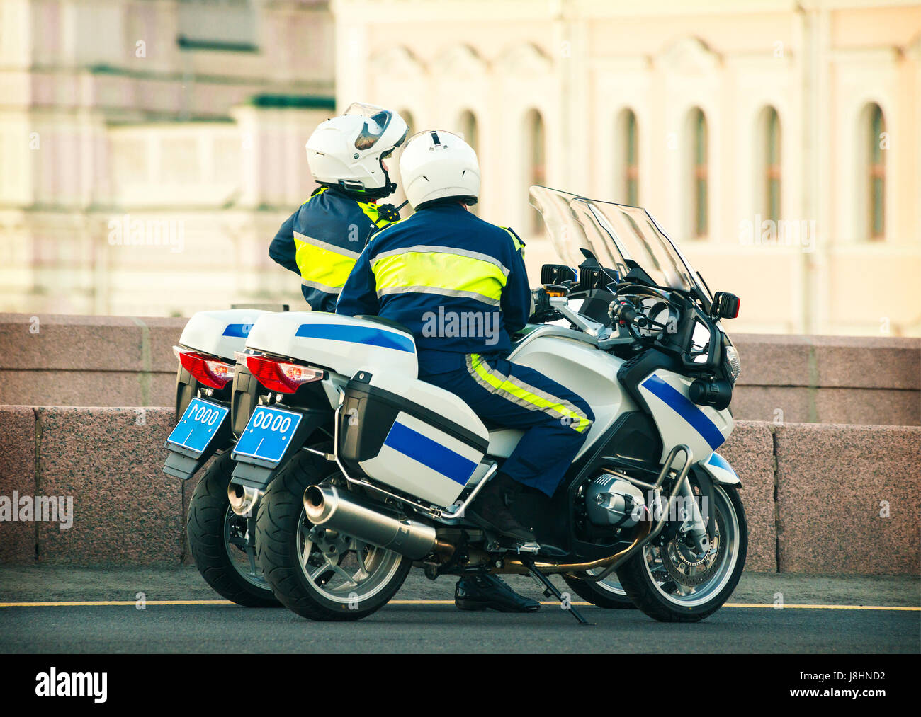 traffic policemen on their patrol motorcycles Stock Photo