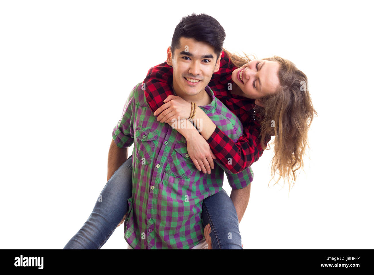 Young couple in plaid shirts Stock Photo