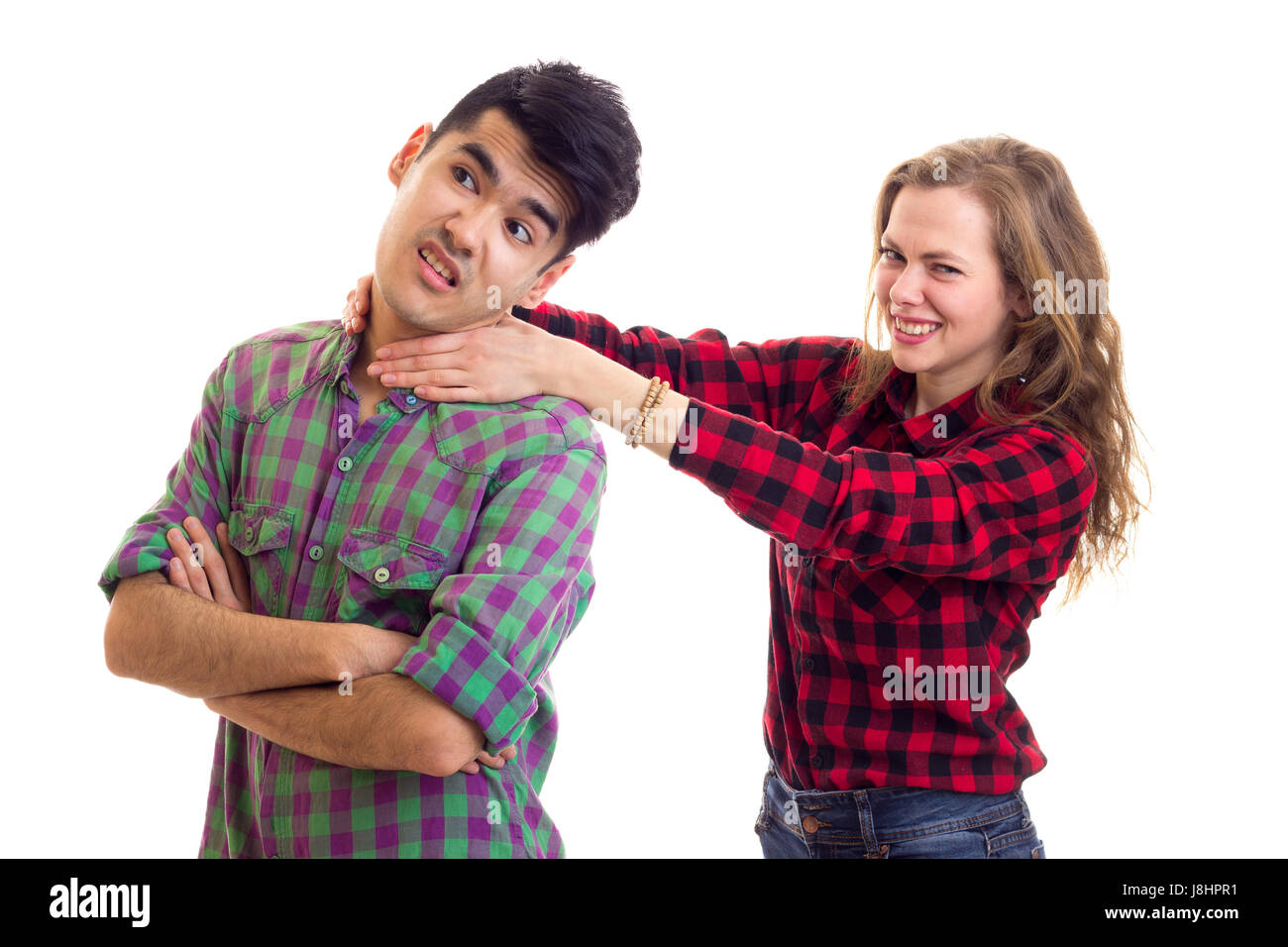Woman strangling man Stock Photo