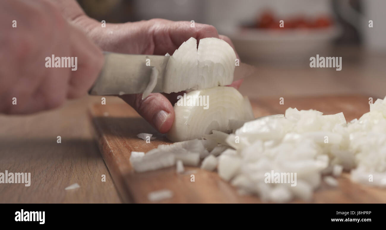 Woman hands knife cut onion hi-res stock photography and images - Alamy