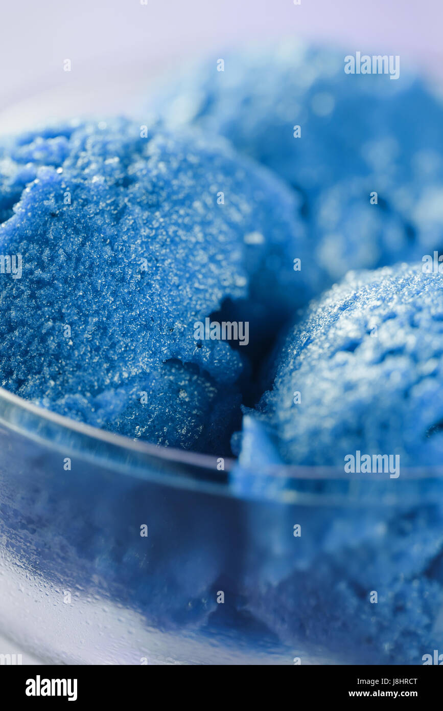 blue sorbet ice cream in glass bowl Stock Photo Alamy