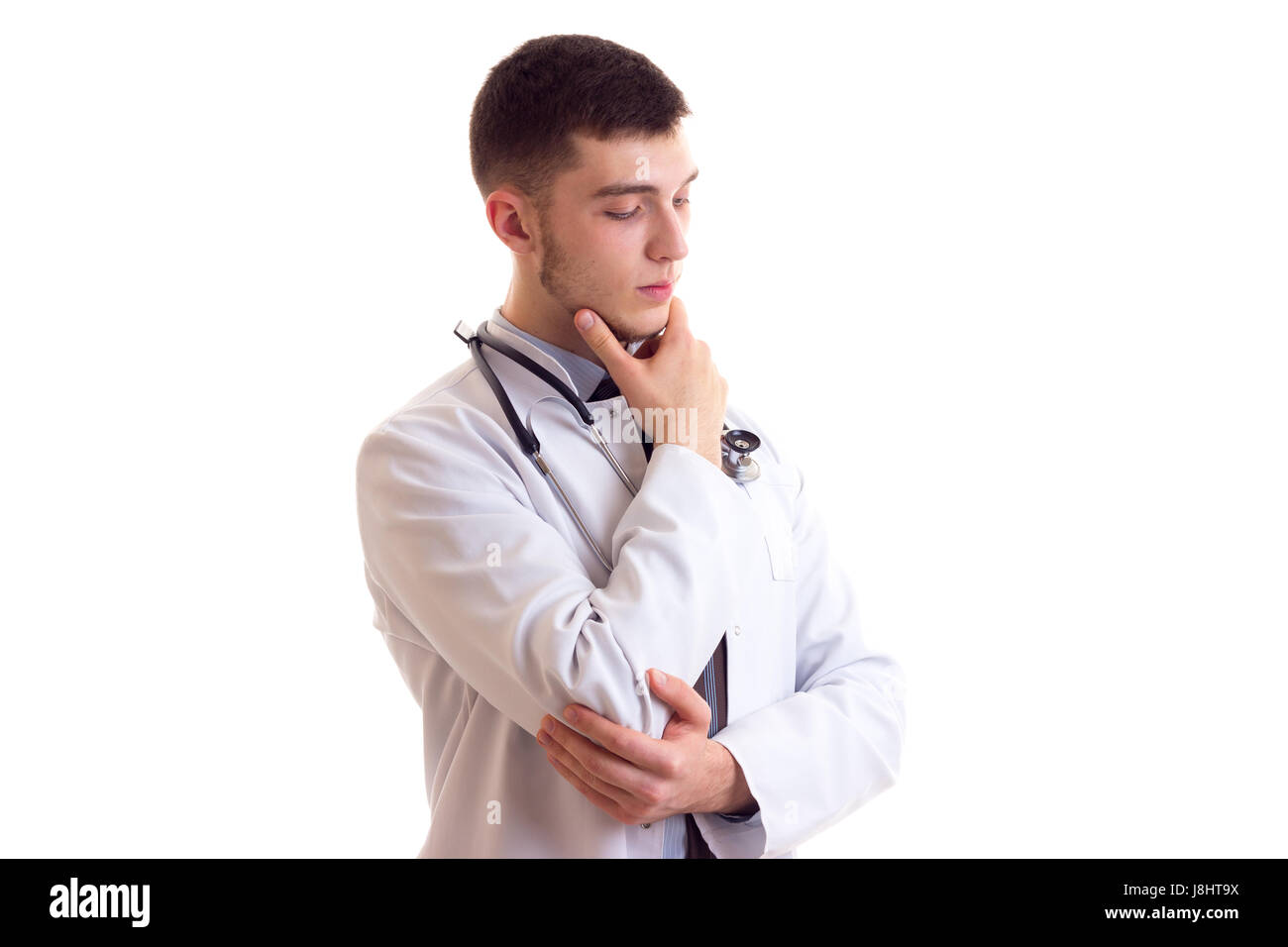 Young man in doctor gown Stock Photo