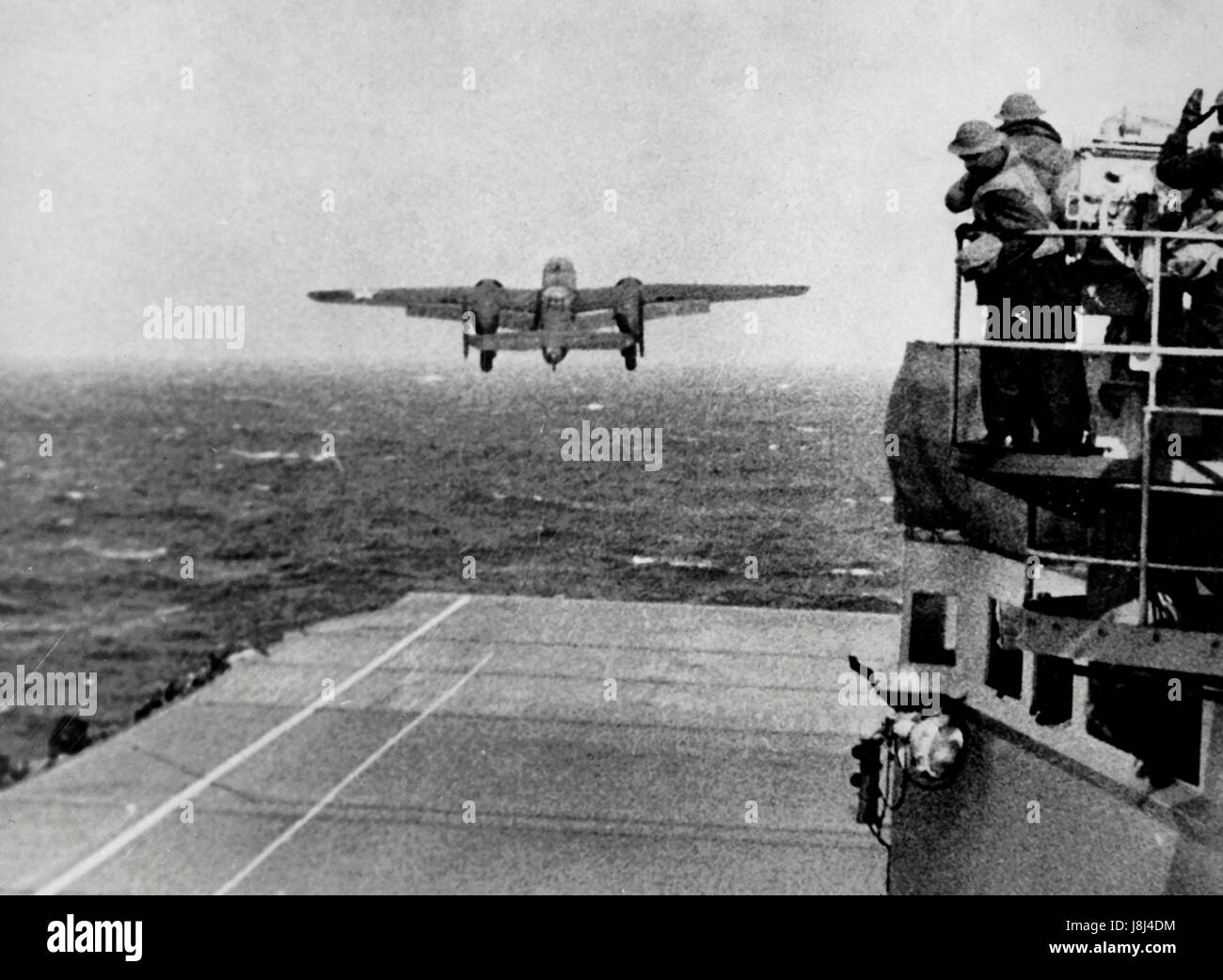 A U.S. Army Air Forces North American B-25B Mitchell bomber takes off from the aircraft carrier USS Hornet (CV-8) during the 'Doolittle Raid'. April 1942 Stock Photo