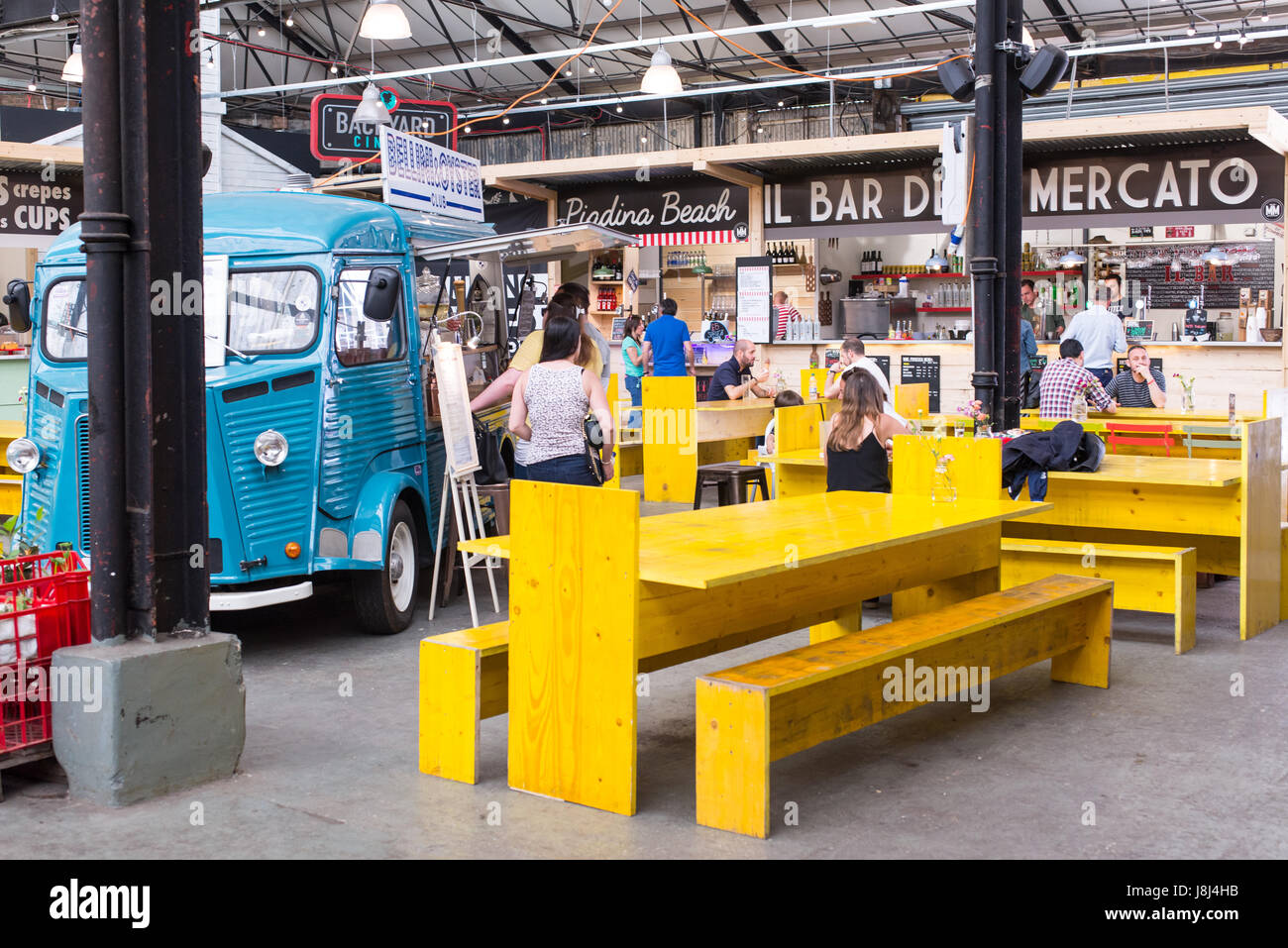 Mercato Metropolitano, a disused paper factory, in Elephant and Castle, is now a market space and lifestyle hub home to food stalls, shops and bars Stock Photo