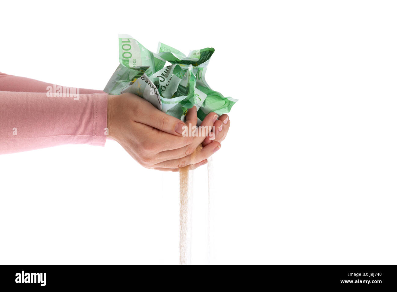 banknotes fall in the sand Stock Photo - Alamy