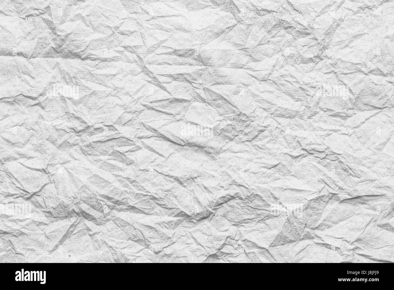 White color creased paper tissue background texture, wrinkled tissue paper  texture. Stock Photo