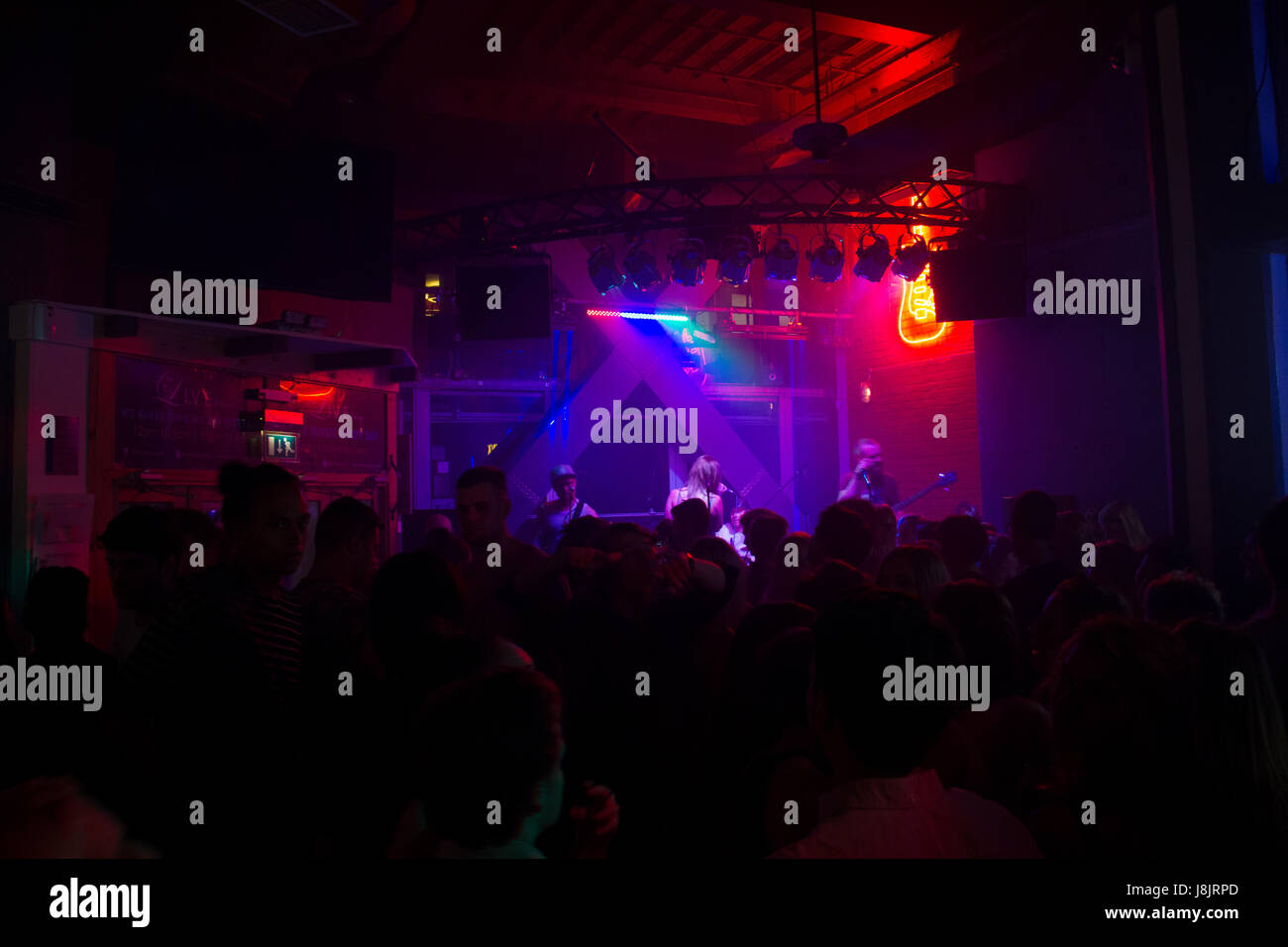 young people enjoying festival and dj music as a crowd Stock Photo