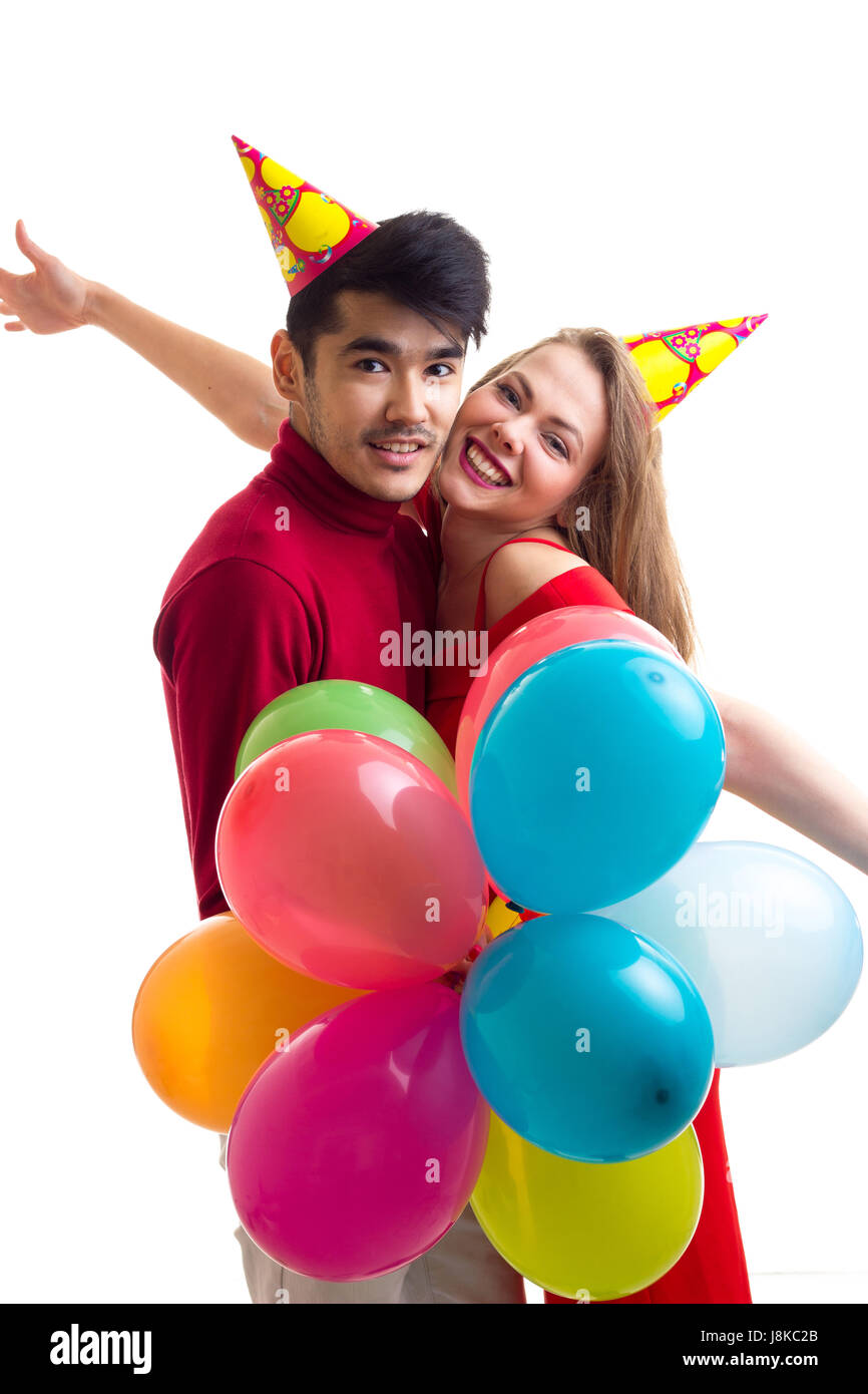 Young couple with balloons Stock Photo - Alamy