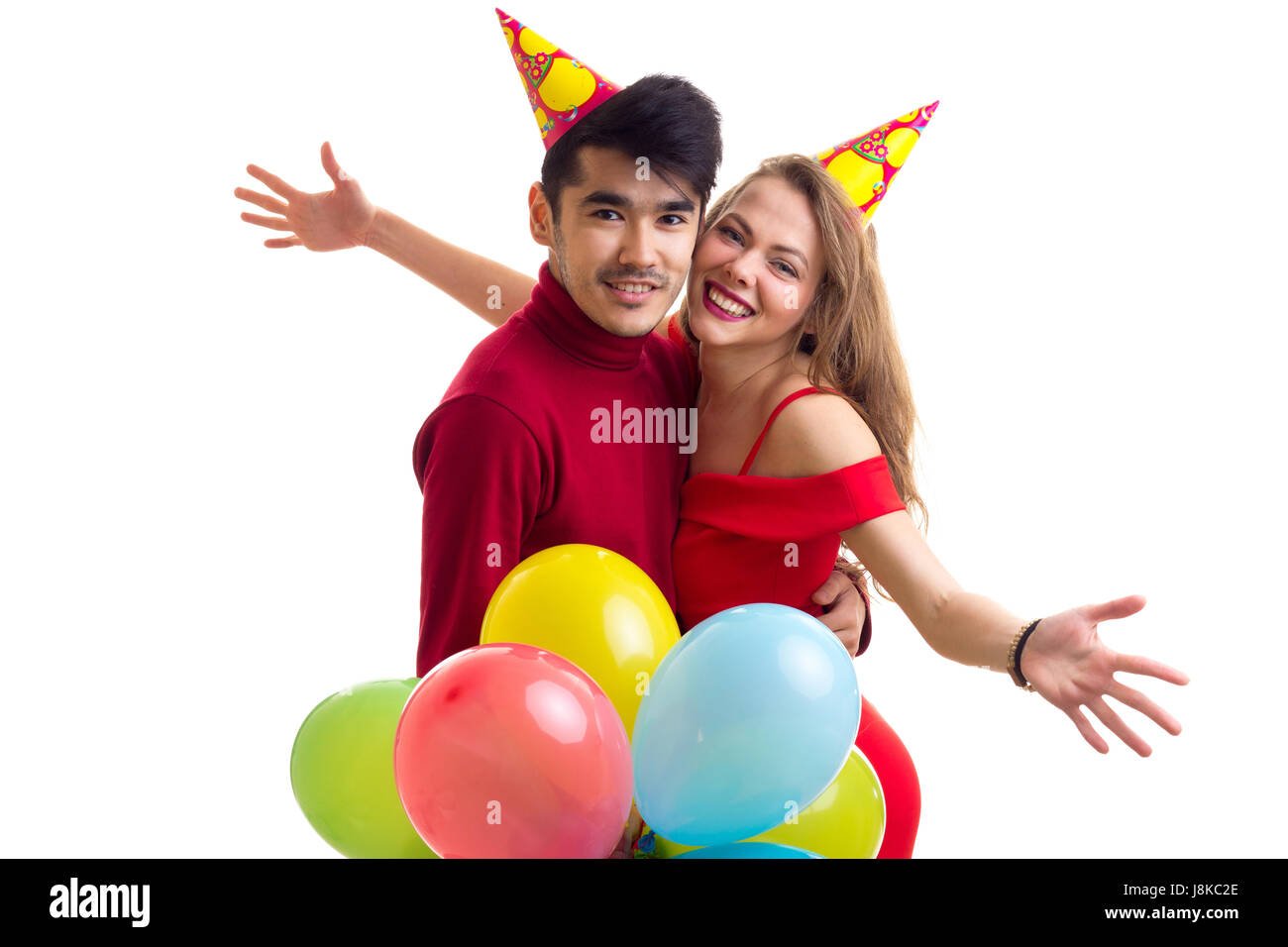 Young couple with balloons Stock Photo - Alamy